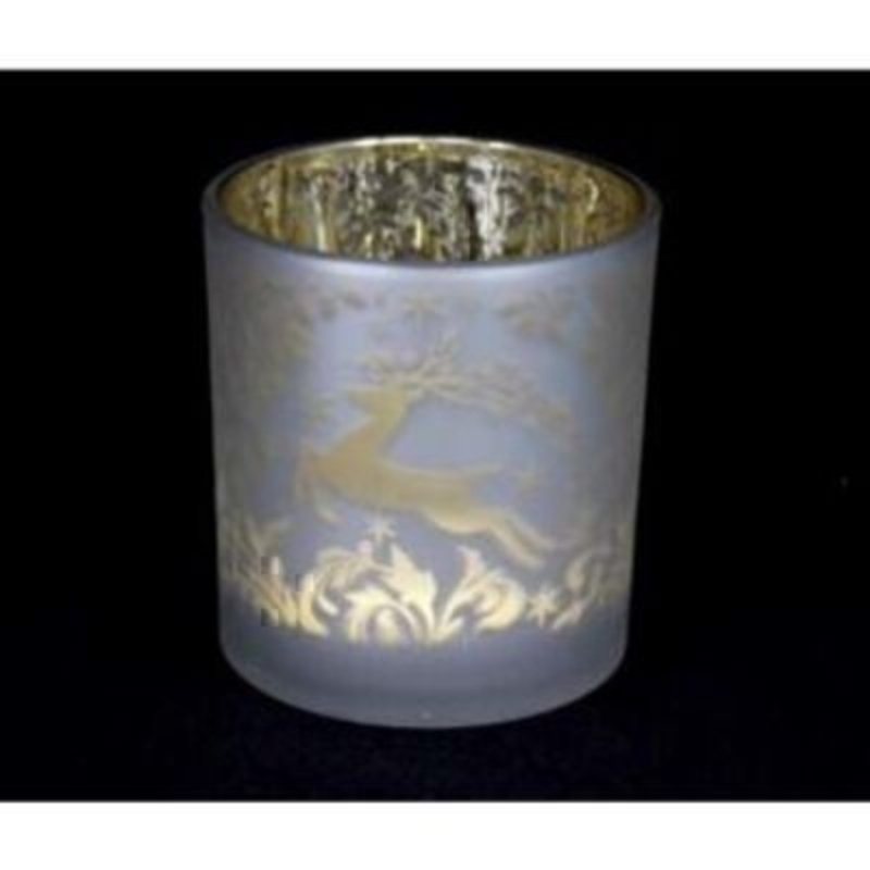 A beautiful opaque glass votive with a golden Christmas reindeer design by the designer Gisela Graham. This would be a lovely addition to your Christmas decorations, or even as a Christmas gift. A great candle holder to hold a T Light with give a beautiful festive glow. Size 8x7cm<br><br>
If it is Christmas Decorations to be sent anywhere in the UK you are after than look no further than Booker Flowers and Gifts Liverpool UK. Our Tree Decorations are specially selected from across a range of suppliers. This way we can bring you the very best of what is available in Tree Decorations.<br><br>
Reindeers are a really festive motive and Gisela Graham has lots of beautiful reindeer in her collection. Christmas Tree Decorations, candle holders, and ornaments. If it is reindeer you love look no further than Gisela Graham Reindeer for beautiful Christmas Decoration.<br><br>
Gisela loves Christmas Gisela Graham Limited is one of Europes leading giftware design companies. Gisela made her name designing exquisite Christmas and Easter decorations. However she has now turned her creative design skills to designing pretty things for your kitchen - home and garden. She has a massive range of over 4500 products of which Gisela is personally involved in the design and selection of. In their own words Gisela Graham Limited are about marking special occasions and celebrations. Such as Christmas - Easter - Halloween - birthday - Mothers Day - Fathers Day - Valentines Day - Weddings Christenings - Parties - New Babies. All those occasions which make life special are beautifully celebrated by Gisela Graham Limited.<br><br>
Christmas and it is her love of this occasion which made her company Gisela Graham Limited come to fruition. Every year she introduces completely new Christmas Collections with Unique Christmas decorations. Gisela Grahams Christmas ranges appeal to all ages and pockets.<br><br>
Gisela Graham Christmas Decorations are second not none a really large collection of very beautiful items she is especially famous for her Fairies and Nativity. If it is really beautiful and charming Christmas Decorations you are looking for think no further than Gisela Graham.<br><br>
This beautiful Reindeer Christmas Candle holder by Gisela Graham is really tastefully done and will compliment any Christmas Decoration. Brought out year after year Christmas Reindeer and Candle light will never get old. This T Light Candle holder with it Reindeer motif if just perfect. Remember Booker Flowers and Gifts for Reindeer T Light Candle Holders by Gisela Graham.
